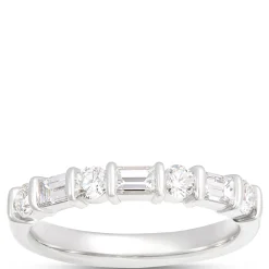 Round and Baguette Diamond Ring, ¾ Total Carat Weight, Platinum Hot